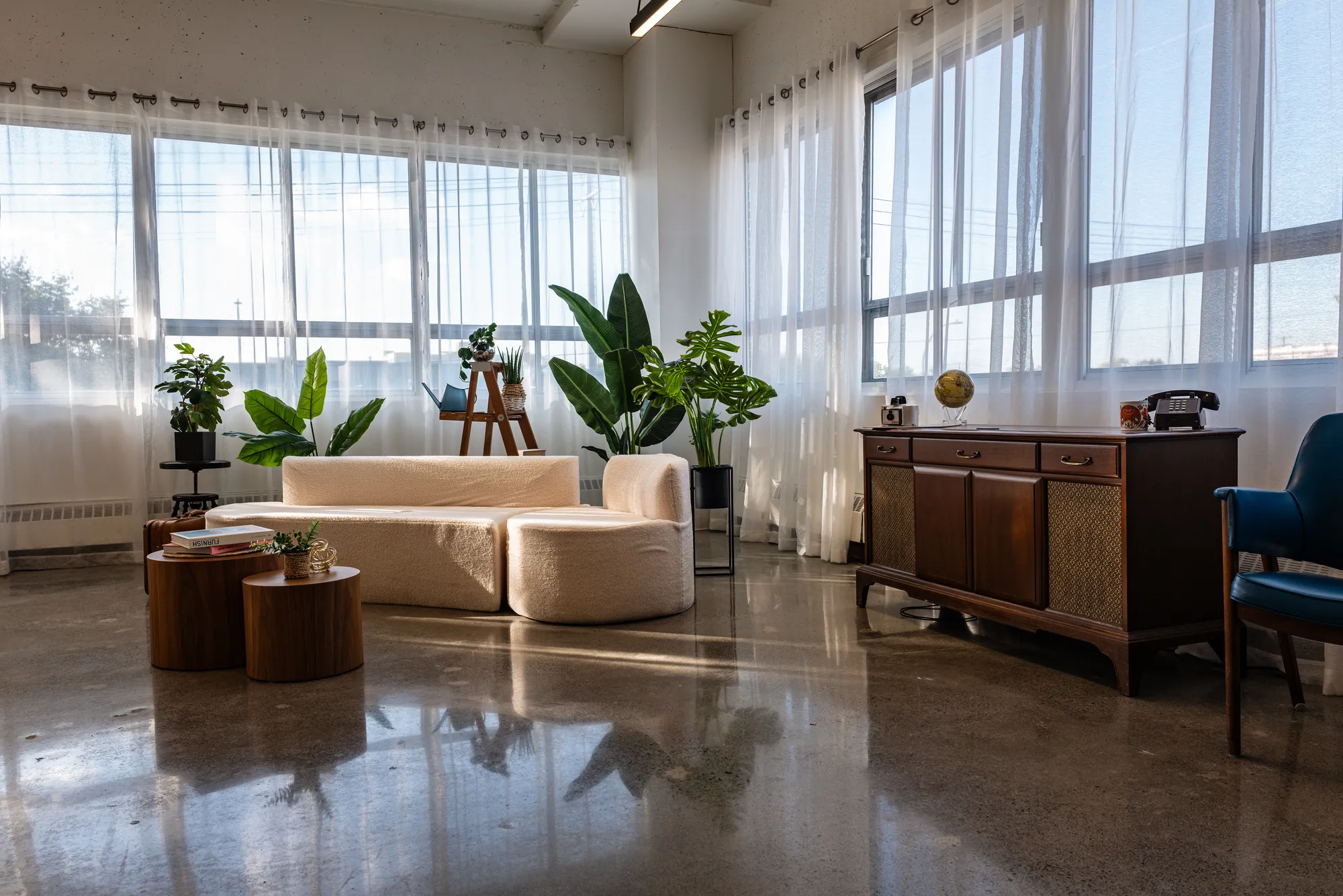 Cream sofa and wooden coffee tables